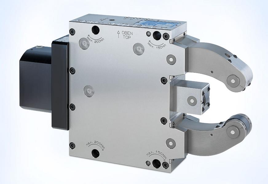 Eine technische Komponente, wahrscheinlich ein Greifer, aus metallischem Material mit zwei beweglichen Armen, die geöffnet und geschlossen werden können. Die Oberfläche hat mehrere Schrauben und Markierungen zur Identifizierung.